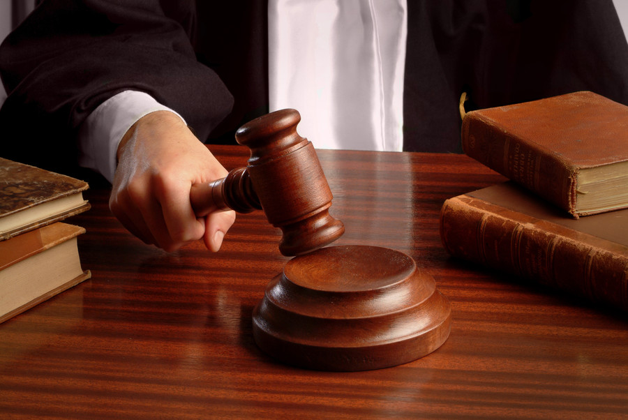 上海刑事案件專業律師來講講集資詐騙被抓后按照安排給同案犯打電話是否認定立功