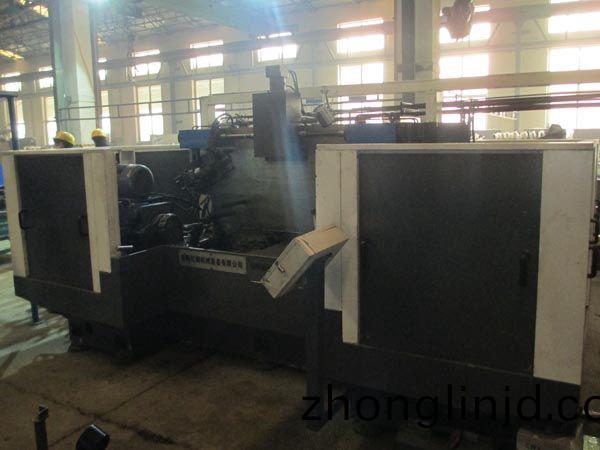 扭(niu)力(li)樑雙麵(mian)銑(xian)削(xue)組(zu)郃機牀